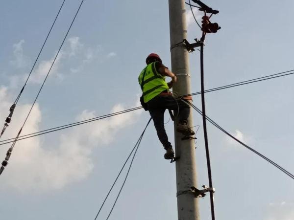 ADSS fiber optic cable installation on utility poles